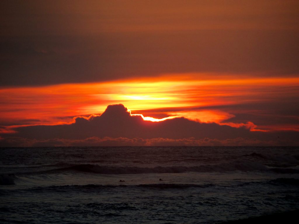 Sunset at El Paredon: the sky is alight with vibrant colours over the Pacific Ocean