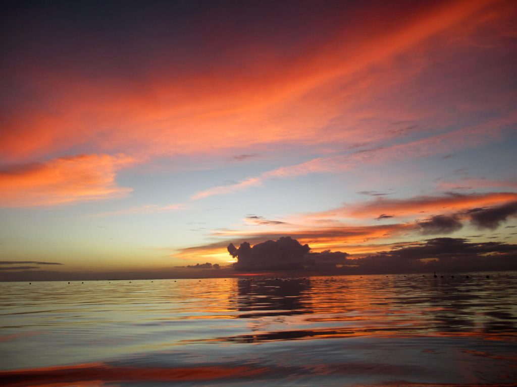 A fiery sunset from the western shores of Caye Caulker