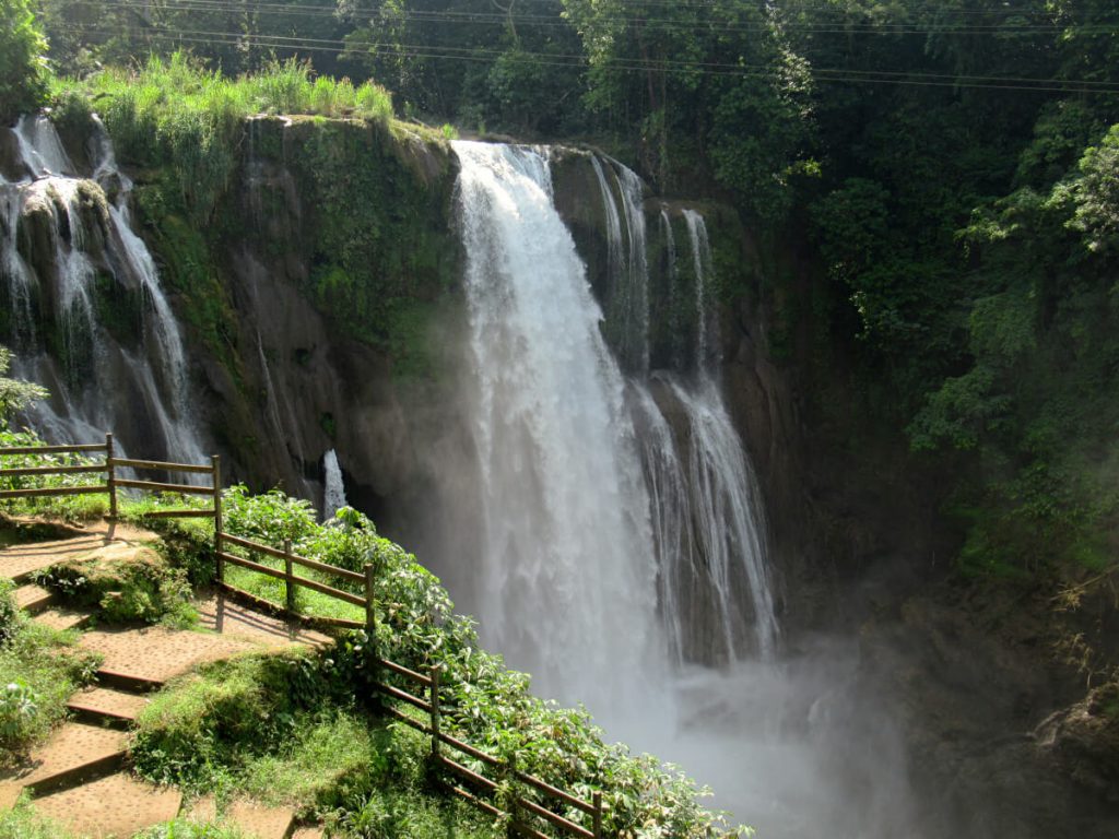 The Pulhapanzak waterfalls in central Honduras. You can zip line over these falls and the wires are visible at the top of the image.